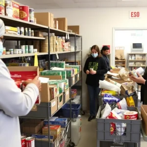 Volunteers arranging food items at the community food pantry