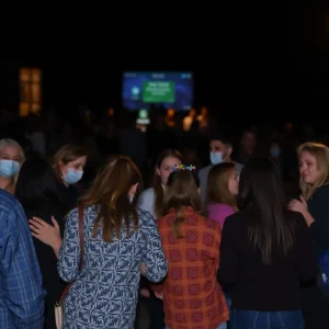 Community members supporting each other after an attack