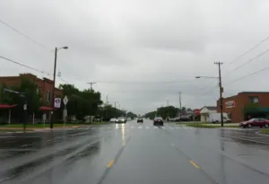 Rainy weather in Laurens County with wet streets and cloudy skies